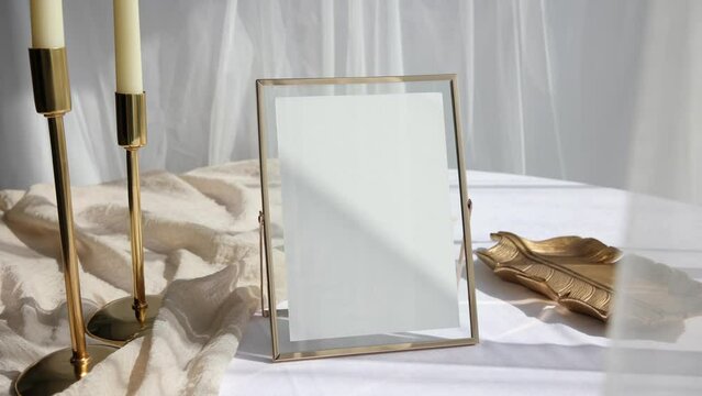 Video 5x7 card mockup in golden photo frame on table