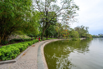 view of The Huc Red Bridge and Ngoc Son temple in the center of Hoan Kiem Lake, Ha Noi, Vietnam.