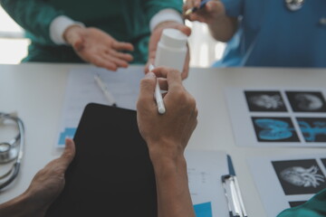 Cropped image of successful medical doctors discussing diagnosis during the conference