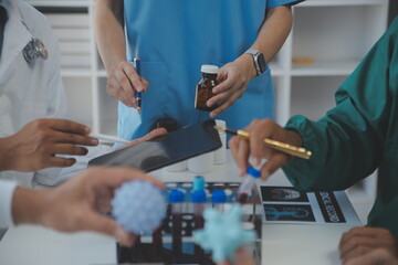 Cropped image of successful medical doctors discussing diagnosis during the conference