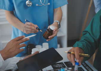 Cropped image of successful medical doctors discussing diagnosis during the conference