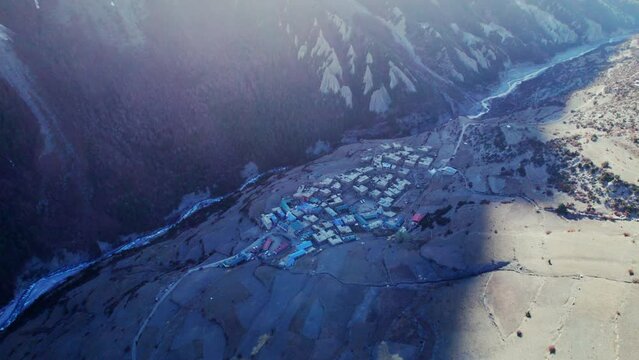 Scenic aerial circle view over Khangshar village houses on mountain valley. Manang district. Tilicho base camp trail. Himalayas mountains. Tourism and Trekking in Himalayas.