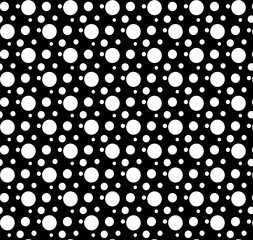 Seamless abstract vector geometric texture in the form of a pattern of white polka dots on a black background