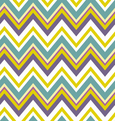 Vibrant chevron seamless pattern made of multicolored zigzags. Summery surface design for printing on fabrics.