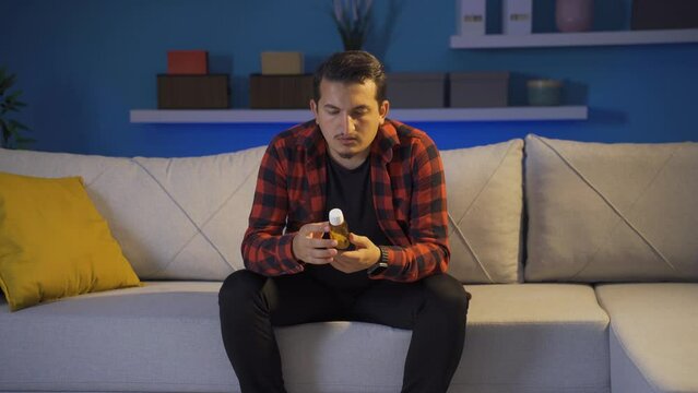 The man who wants to commit suicide by taking pills.