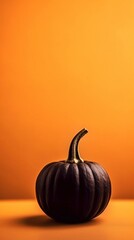 Black pumpkin on minimalistic orange solid background, copy paste. AI generated