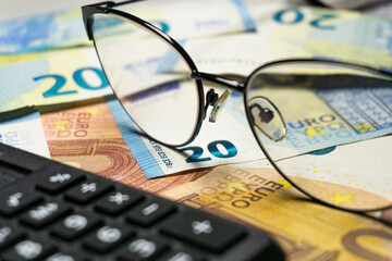 Cash money banknotes background. Photo for banner on website. Photo of accountancy or banking background. 10, 20, 50 EURO notes. Changes in wages and taxes. Rising inflation. EUR