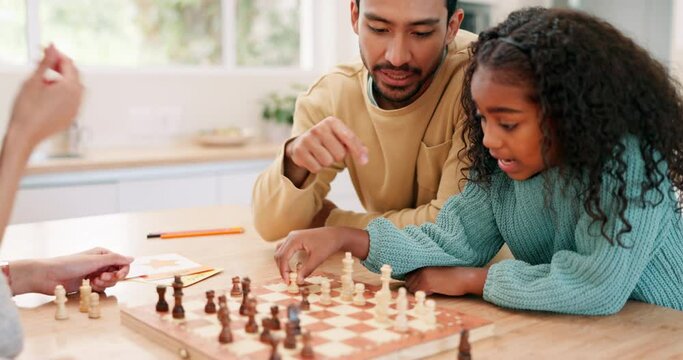 Family, father and children playing chess at a table while teaching and learning board game. Happy man and girl kids together at home for development, problem solving and strategy for fun competition