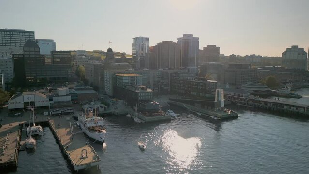 Halifax, Canada, Cinematic Drone Shot of the Skyscrapers in the City's Business Center on the Shores of the Atlantic Ocean. Aerial View of the City with High Skyscrapers Near the Ocean. 