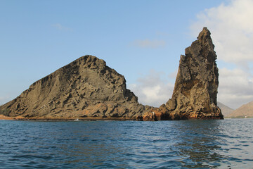 The Pinnacle rock, a famous landmark on Bartolomé Island of the Galapagos archipelago, is a beautiful natural attraction, filming location and dream destination.