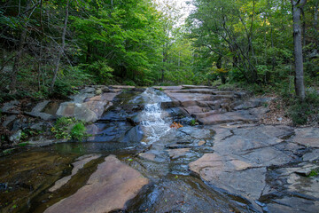 Waterfall in a forest of Catalonia in a natural park