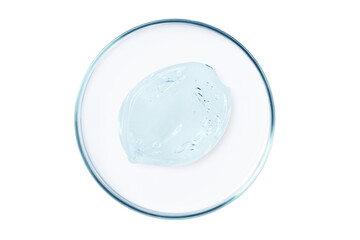 Petri dish with a drop and a smear of a transparent gel or serum on an empty background.
