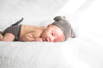 Cute baby sleeping 5 days old on light blanket. Banner design with space for text