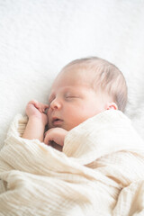 Cute baby sleeping 5 days old on light blanket. Banner design with space for text