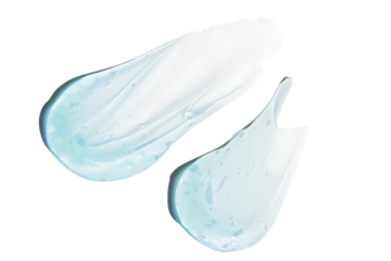 Composition of smears and drops or drops of a transparent blue gel, serum. On an empty transparent background.