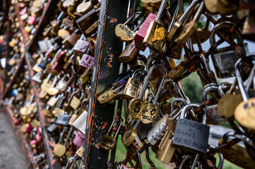 Close up of padlocks (love locks) on fences in PARIS, FRANCE - July  2023.