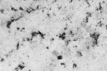 Gray granite stone background and texture with black spots