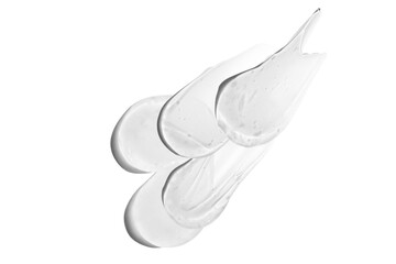 Composition of smears and drops or drops of a transparent gel, serum. On an empty transparent background.