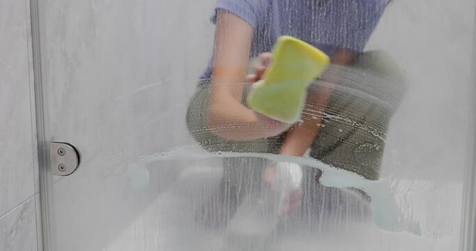 Removing hard water stains and deposits in bathroom