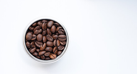 Roasted Coffee beans in metal bowl on white background