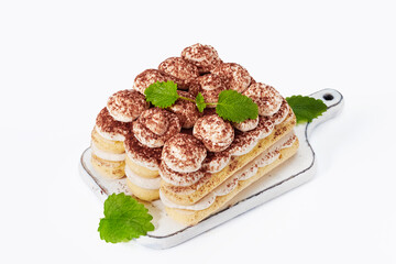 Traditional Italian dessert tiramisu  isolated on white