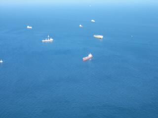 Container ships on the sea off the coast of Gibraltar, photographed from above the Rock of Gibraltar