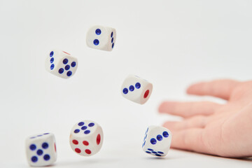 Playing dice for gambling and tabletop games, flying in air, poker isolated on white background,...