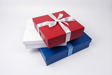 Red, white and blue giftboxes on the white background. Generative AI