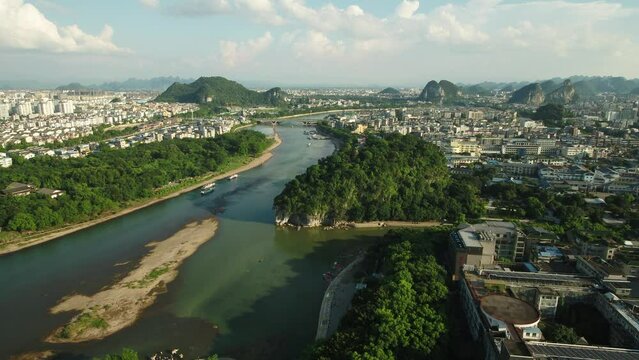 Lijiang River is a river in Guilin City, Guangxi Zhuang Autonomous Region, China. It is 164 kilometers long and flows through the counties of Yangshuo, Xing'an, Guilin and Pingle. 