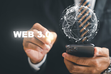A smart and futuristic phone becomes the gateway to Web 3.0 as a businessman explores the potential of this new digital frontier, unlocking opportunities for innovation and growth. we3 concept