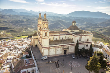 Fototapeta na wymiar Scenic panoramic view of Church of Nuestra senora de la encarnacion in Olvera one of the white villages in Andalusia, Spain.