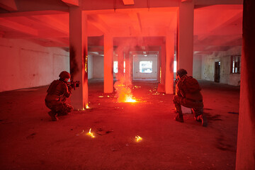  A group of professional soldiers bravely executes a dangerous rescue mission, surrounded by fire...