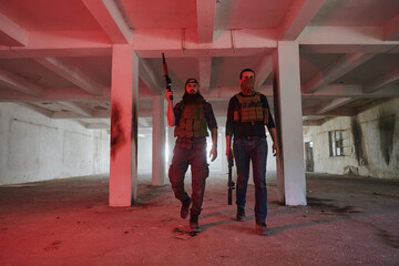 An abandoned building serves as the stronghold for a team of terrorists, fiercely guarding their occupied territory with guns and military equipment