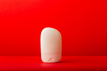 white container to label on a red background 