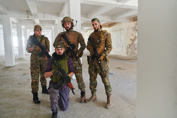 Fototapeta premium Soldier squad team portrait in urban environment