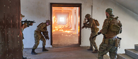  A group of professional soldiers bravely executes a dangerous rescue mission, surrounded by fire...