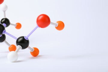 Molecule of sugar on white background, closeup. Chemical model