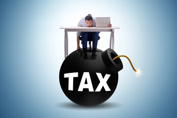 Tax concept with exploding bomb
