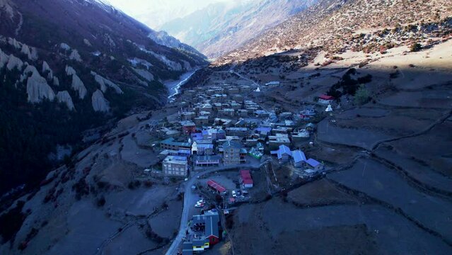 Aerial tilt up view beautiful Khangshar village houses. Manang district. Tilicho base camp trail. Himalayas mountains. Tourism and Trekking in Himalayas concept.