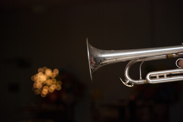 Fototapeta na wymiar trumpet being played and expulsing lights