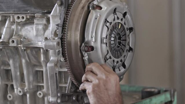 Car Engine Clutch Pad Replacement in the Repair Shop Footage.