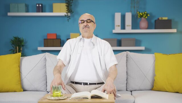 Sick old man with rapid breathing. The old man cannot control his breathing.