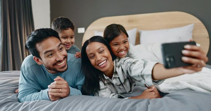 Happy family, selfie and bed with parents, kids and smile for post, blog or social media app with care in home. Mother, father and children with photography, profile picture and memory with bonding