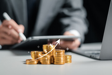 Businessman collecting coins with profit chart analysis business growth, profit growth management...