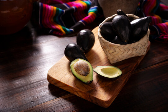 Aguacate Criollo. Home harvest of "criollo avocado", this variety is the ancestor of the domesticated varieties that we know today, they are small with thin black skin and large seed.