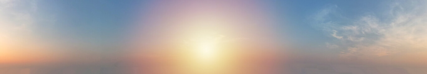 Panorama landscape of sky adorned with the golden hues of the beautiful sunlight, casting a warm and enchanting glow that painted the world with a sense of wonder and serenity.