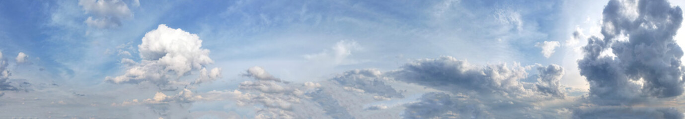 Panorama landscape a white and blue clouds with white light illuminated the scene, creating a serene and ethereal atmosphere.