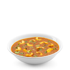 Cashew Curry / Indian kaju masala served in a white bowl on white background, selective focus