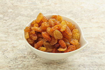 Sweet yellow raisin in the bowl