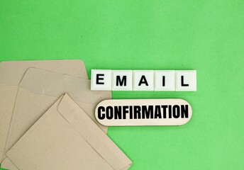 envelope with the word email confirmation. the concept of verification by email
